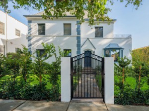 Front gate view of French Normandie apartment building